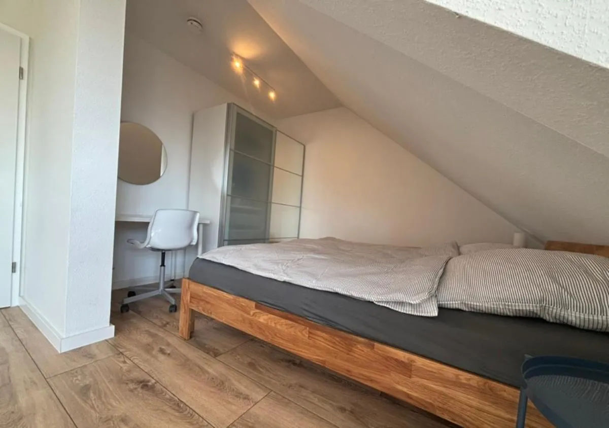 Image 6 of Zentrales, modernes Apartment mit Balkon, Küche & Garage